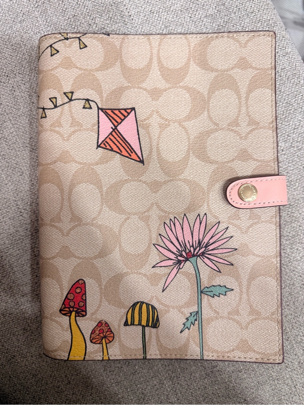 Coach Beige Signature Canvas Folio with Pink Tab and Floral Kite Print